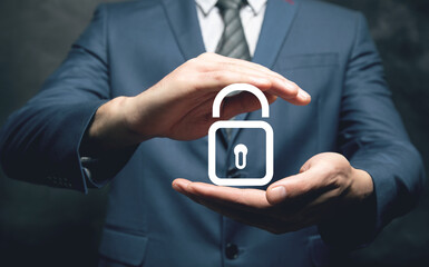Businessman and lock icon on virtual screen, concept of privacy