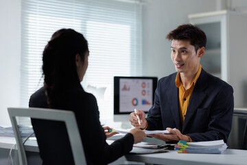 Business man meeting with client discussing documents
