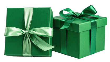 Two green boxes wrapped with ribbons, isolated on a black background