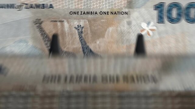 Zambia kwacha Zambian money counting machine with banknotes. Quick 100 ZMW currency note down rotation. Business and economy concept loopable and seamless background.