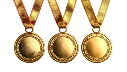 Trio of shiny golden medals hanging with dark ribbons overhead