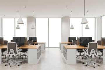 Contemporary office interior with ergonomic chairs, wooden desks, and large transparent windows on white background. 3D Rendering