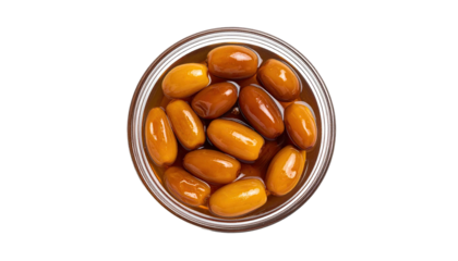 Overhead view of pickled oblong objects in a glass container