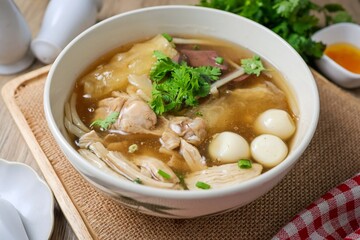 fish maw soup in a white bowl