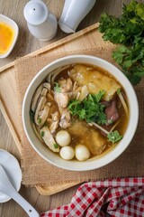fish maw soup in a white bowl