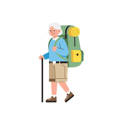Elderly woman hiking with a backpack and walking stick in nature  