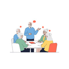 Senior man leading group discussion at table with elderly participants  