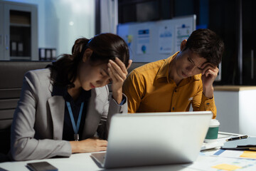 Business team sitting stress and worried problems from working in the office.