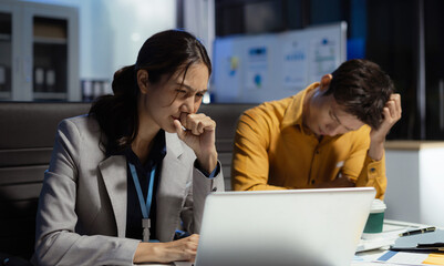 Business team sitting stress and worried problems from working in the office.