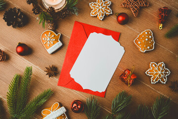 Christmas cookies greeting card invitation template on rustic wood with pine needles and ornaments
