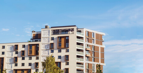 Modern Residential Apartment Building Complex Condo on a blue sky background