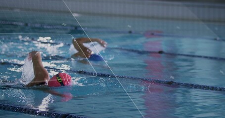 Racing swimmer wearing pink cap goggles performing backstroke in pool, lane dividers, copy space