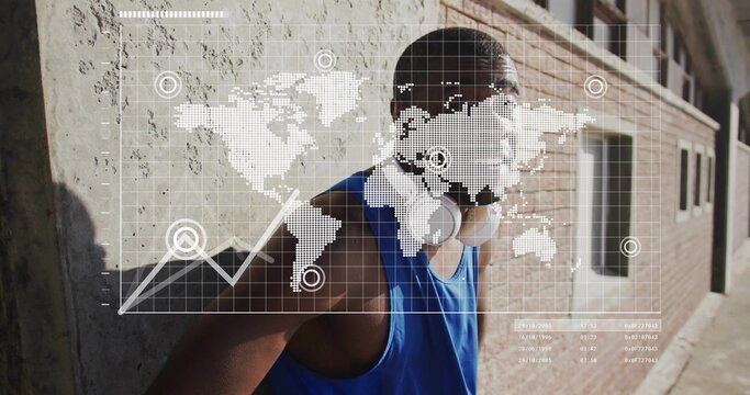 Leaning man in blue tank top shading eyes in alley, featuring white headphones, world map overlay