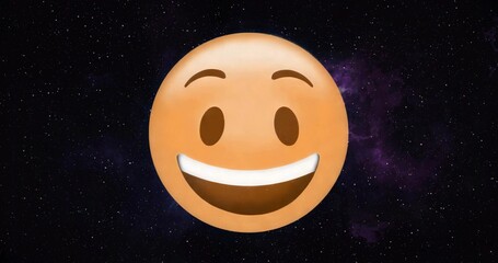 Fototapeta premium Displaying large orange smiling emoji face floating in star-filled outer space, with purple nebula
