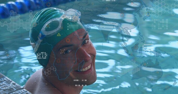 Smiling swimmer leaning over pool edge, with green cap, white goggles and data overlays, copy space
