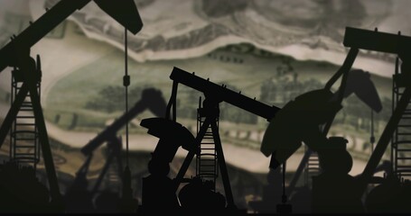 Showing oil pumpjack machines standing in outdoor oil field, featuring banknote backdrop