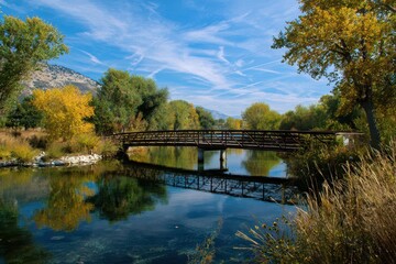 Jordan River Utah. Bridge Over the River, Water and Sky Landscape