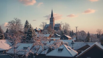 Shifting dawn sky from pale blue to warm pink above snowy rooftops, highlighting church steeple - Powered by Adobe