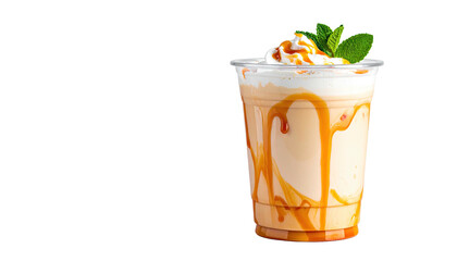 Caramel drink in plastic cup, topped with whipped cream and mint