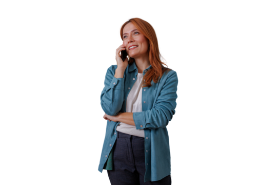 Redhead woman smiling, talking on a mobile phone, representing communication and connectivity. Transparent background