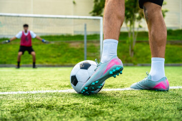 Soccer player preparing a powerful penalty kick