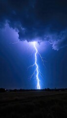 Fototapeta premium Dramatic overhead shot of a powerful lightning bolt striking the ground during a nighttime thunderstorm, illuminating the dark landscape with brilliant white light , landscape, weather, strike