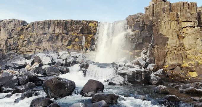 Oxarafoss or the waterfall in the Ax River, in the Thingvellir national park, Iceland, panoramic view