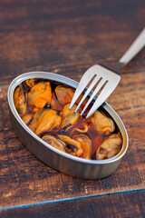 Canister of canned soused mussels