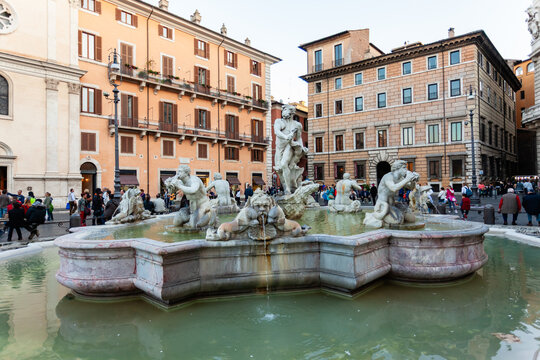 Rome, Italy - 02 November 2012: View of the Fontana dei Quattro Fiumi in Piazza Navona, its baroque sculptures gleaming against the soft hues of the surrounding buildings.