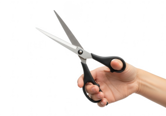 Hand holding a pair of scissors isolated on transparent background, ready for cutting and crafting projects