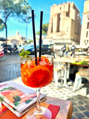 Aperol Spritz cocktail served at an outdoor caf&eacute; in Rome, Italy