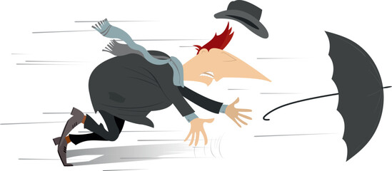 Stormy weather. Man loses an umbrella and a hat on the strong wind