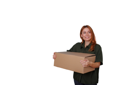 Woman red hair carrying cardboard box package, smiling for delivery service, moving, or shipping on transparent background