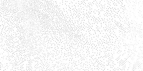 Abstract black dots scattered on a white background with a gradient density effect vector