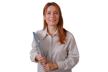 Confident businesswoman smiling, holding laptop, representing professional success and technology on transparent background