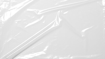 plastic overlay texture of realistic crumpled transparent plastic film wrap on black background,wrinkled stretched plastic effect.	