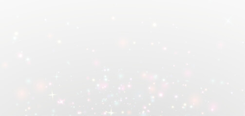 Glowing sparkle glitter magic dust trail floating softly on starlight background.
