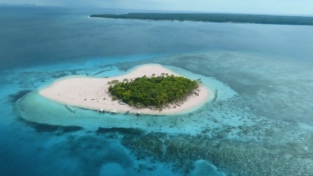 Aerial 4K Patawan Island, Balabac, Pristine White Sand Beach, Turquoise Water
pristine white sand beach and the iconic crystal-clear turquoise water.