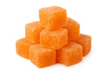 Vibrant stack of orange gummy cubes covered in sugar, representing a sweet indulgence and sugary snack
