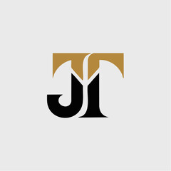 A stylized logo featuring intertwined black letter 'J' and gold letter 'T' on a light gray background, representing initials or a brand.