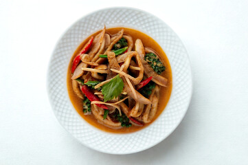 Spicy stir fried squid with vegetables in savory sauce