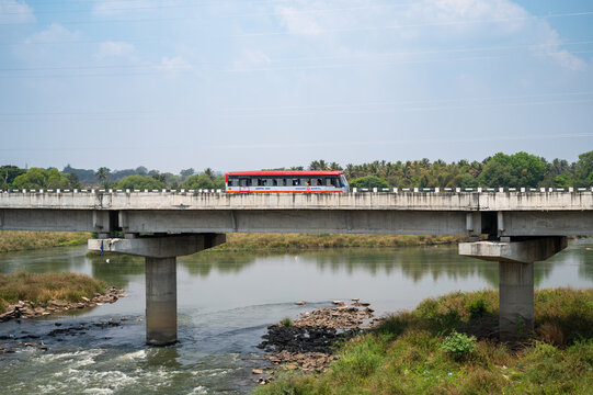 Wellesley old stone bridge over Kaveri river in Srirangapatna, connection between Mysore and Bengaluru, India, bus crossing the riverbed