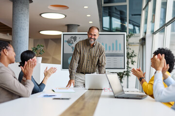 Group of young business people having a meeting or presentation and seminar with digital display whiteboard in the office. Portrait of a young businessman leader