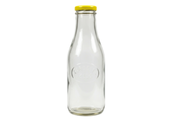 Isolated vintage style clear glass milk bottle with a yellow cap on a neutral background