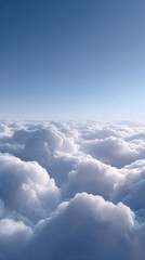 Fototapeta premium Peaceful aerial view high above cloud, tranquil cloudscape with white fluffy texture under clear blue sky. An inspiring and calm background scene of nature and freedom