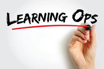 Learning Ops phrase underlined by hand in red, concept for operational learning systems, continuous education cycles, adaptive workforce training, and iterative skill improvement