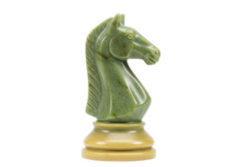 Isolated jade knight chess piece, carved from green stone, resting on a beige pedestal base