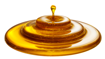 Viscous golden liquid forming concentric rings and droplet