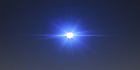 Blue light flare with shining rays on dark background