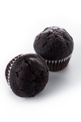Homemade chocolate muffins isolated on white background